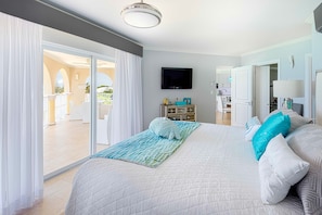 The master bedroom has stunning ocean views through the large double sliding doors