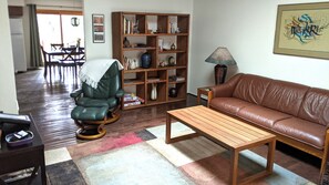 Living room with a  small library of local southwestern books and various games.