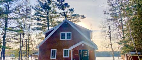 The cozy lake house on Forest Lake during winter.