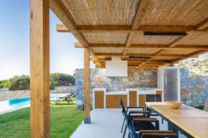 Outdoor kitchen with dining area