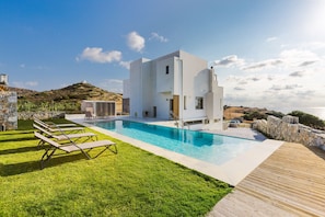 The villa accommodates 9 guests in beds and up to 10
