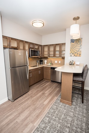 The fully-equipped kitchen features all the amenities you'd need to make a delicious meal.