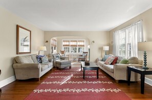 We just love the Arched Doorways & Hardwood Floors.