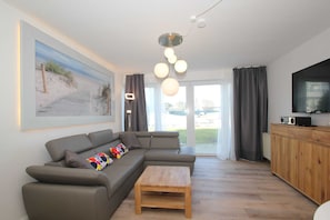 Wohnzimmer mit Schlafsofa