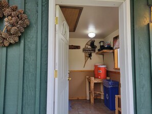 Let's enter into the mudroom - this home has two locked doors for extra security