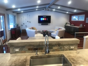 Main Level Great Room with 75" TV and Dry Bar