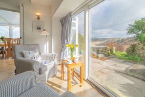 Ground floor: Seating area with french door access to patio garden