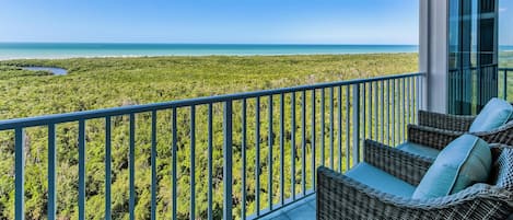 View from balcony (Clam Pass and Ocean) - enjoy the comfortable swivel rockers