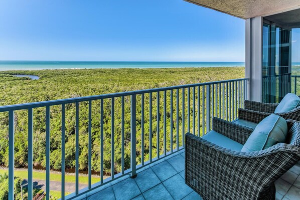 View from balcony (Clam Pass and Ocean) - enjoy the comfortable swivel rockers