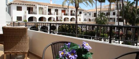 Morning coffee on the balcony overlooking the plaza