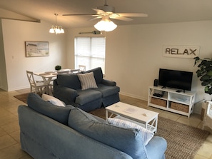 Living area with TV, Fan.