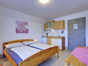 Furniture, Interior Design, Wood, Bed, Bedroom, Floor, Room, Flooring, Ceiling, Bed Sheet