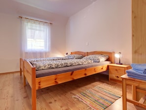 Wood, Bed, Bedroom, Interior Design, Floor, Flooring, Bed Sheet, Wood Flooring, Bedding, Home