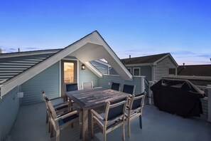 Top Level Rear Porch with ocean views and the boardwalk. Seating for 6 and a BBQ