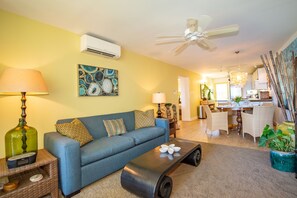 Stay cool with ceiling fans and Split A/C in the living room