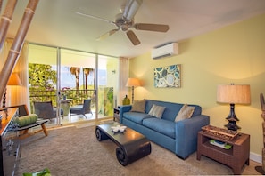 Living Room features split A/C as well as ceiling fans throughout
