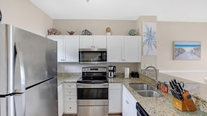 Updated kitchen with vinyl flooring throughout