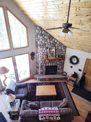 Eagle eye view of the great room and gas fireplace.