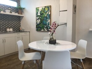 Modern Full Kitchen with brand new french Stainless Steel Fridge.