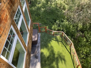 Fenced bark yard overlooking forest and wetland. Great for kids and dogs