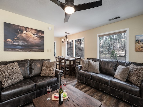 Mountain Getaway on the River - Midtown Riverfront 3 is a comfortable mountain escape situated in a wooded setting along the river. You can settle in and have a fabulous vacation here!