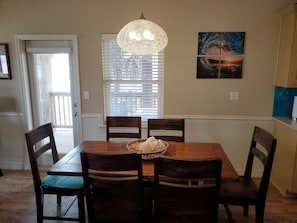 Here's the dining table and chairs with room for eight.