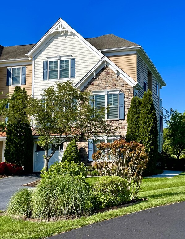 End unit townhome with parking for three vehicles