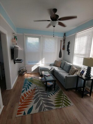 Living area with sofa bed with gel mattress for added comfort.