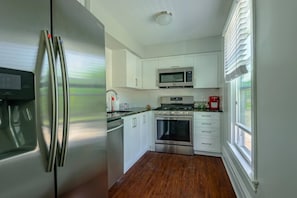 Fully equipped kitchen with a full size fridge