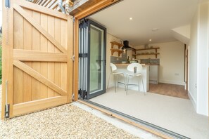 Jasmine Cottage, South Creake: The Annexe entrance via bi-fold doors into the kitchen area