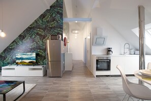 Living room, kitchen and dining area