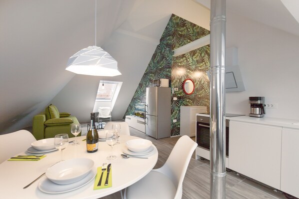 Living room, kitchen and dining area