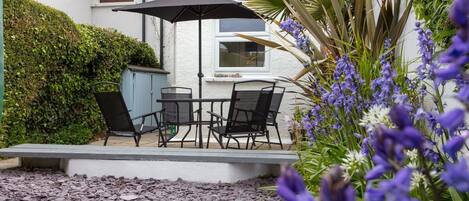 Private back garden with patio area great for a BBQ!
