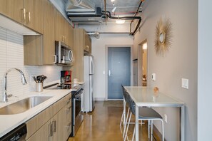 Escape the confines of a hotel with this fully-furnished kitchen.