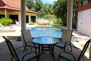 Delightful seating area in the sala, for enjoying Al Fresco dining