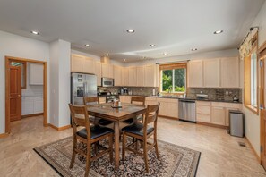 Table has a leaf to extend for up to 6 guests