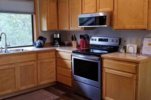 All new kitchen appliances, new floors, new plates, silverware, utensils.