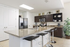 Fully Stocked Kitchen Area provides all cooking utensils needed to prepare your home cooked meals