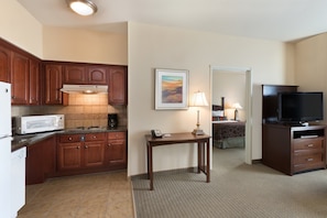 Prepare a meal in the equipped kitchen.