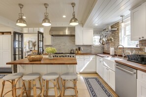 Kitchen. high end appliances. microwave, crock pot, dishes, cooking utensils 
