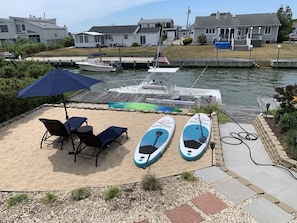 Your very own sand “beach”. Dig in your toes while the kids build sandcastles.