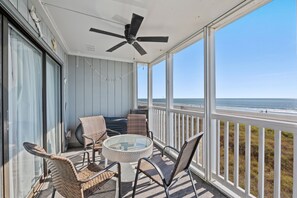 "Seas" the day in your screened-in oceanfront balcony.