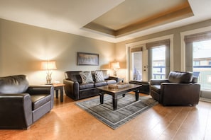 Huge Living Room w/ Queen Size Sofabed. Lots of seating & a Fireplace.  