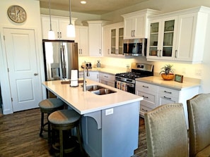 Gorgeous modern kitchen with stainless steel appliances