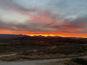 Sunrise from roof deck of surrounding mountains 