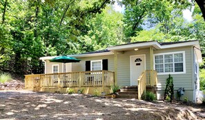 Front of house with deck overlooking the national forest