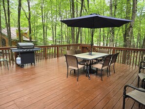 gas grill and seating for everyone on the beautiful oversized deck!