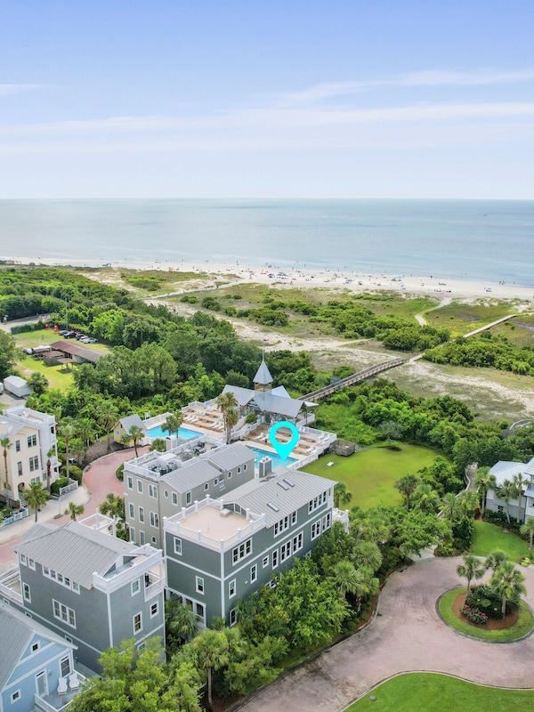 Aerial views of the Beach Lawn cottage and the Coast Cottages Pool Pavilion