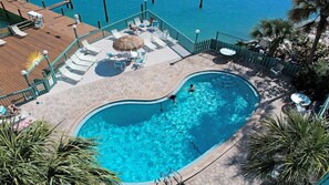 Watch for dolphins as you relax poolside in our heated pool!
