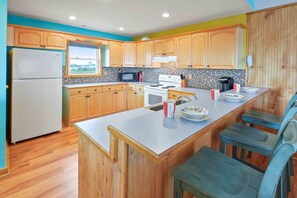 Planning and creating meals are a breeze in this well-equipped kitchen.